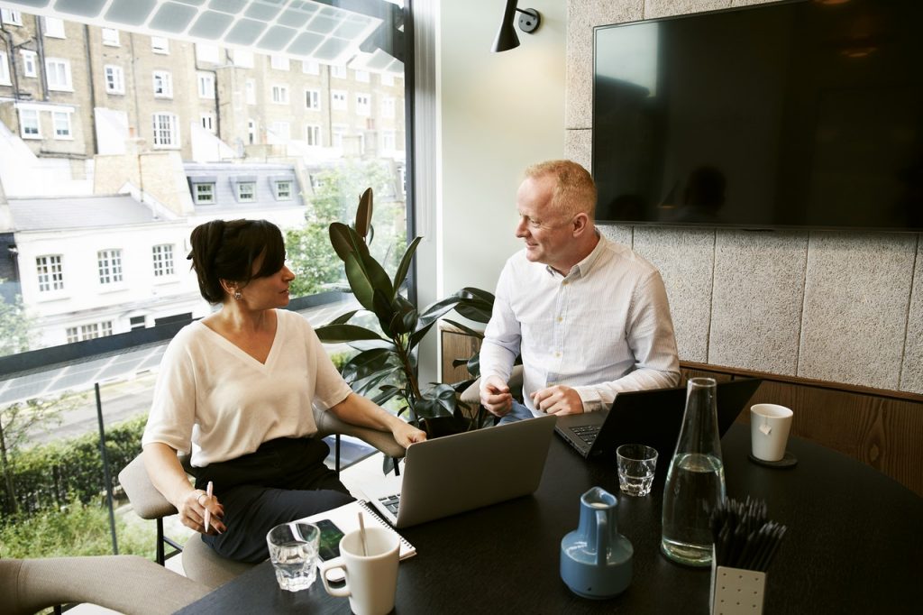 branding consultant talking to client